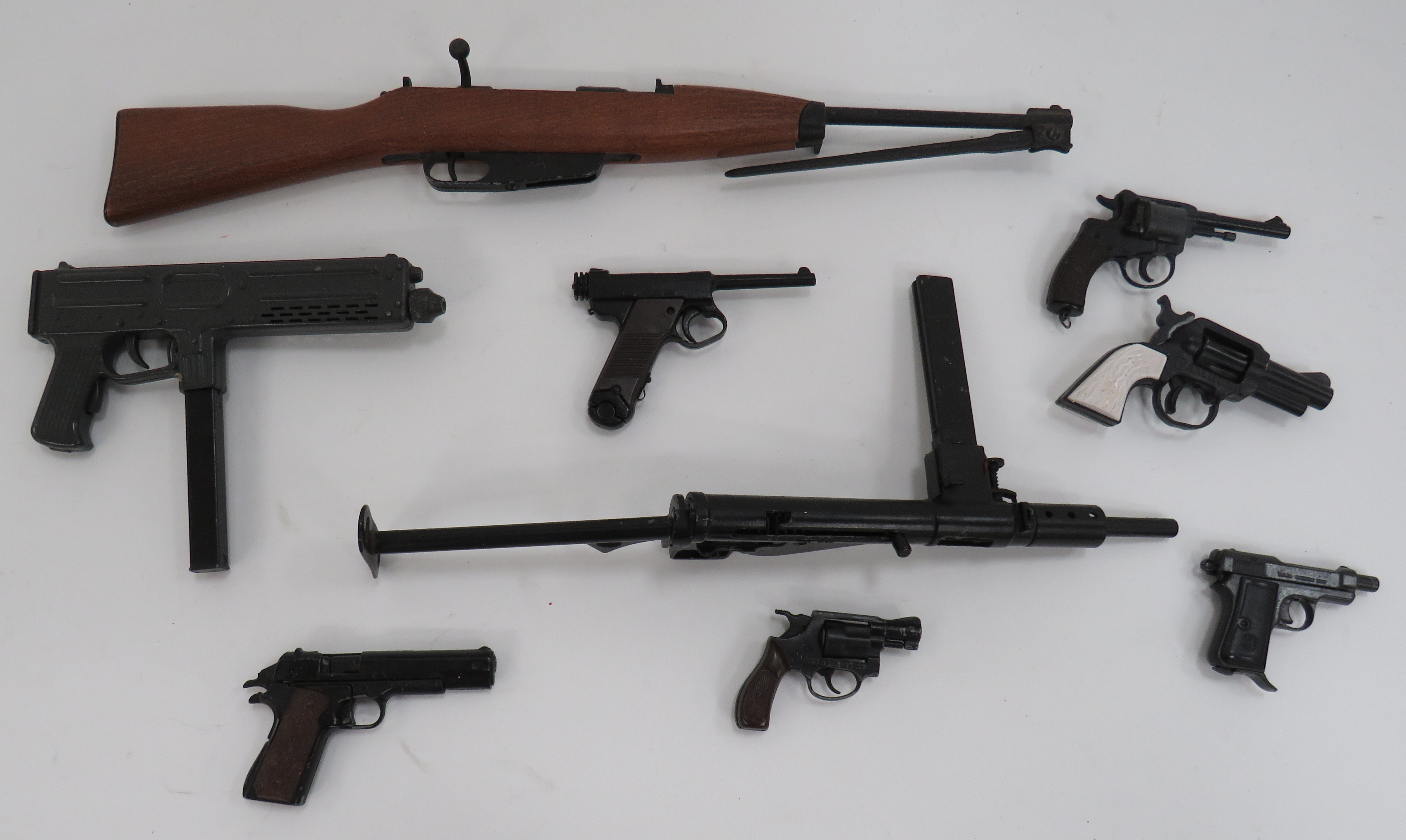 Small Selection of Miniature Guns consisting Italian carbine with folding bayonet ... MKII Sten
