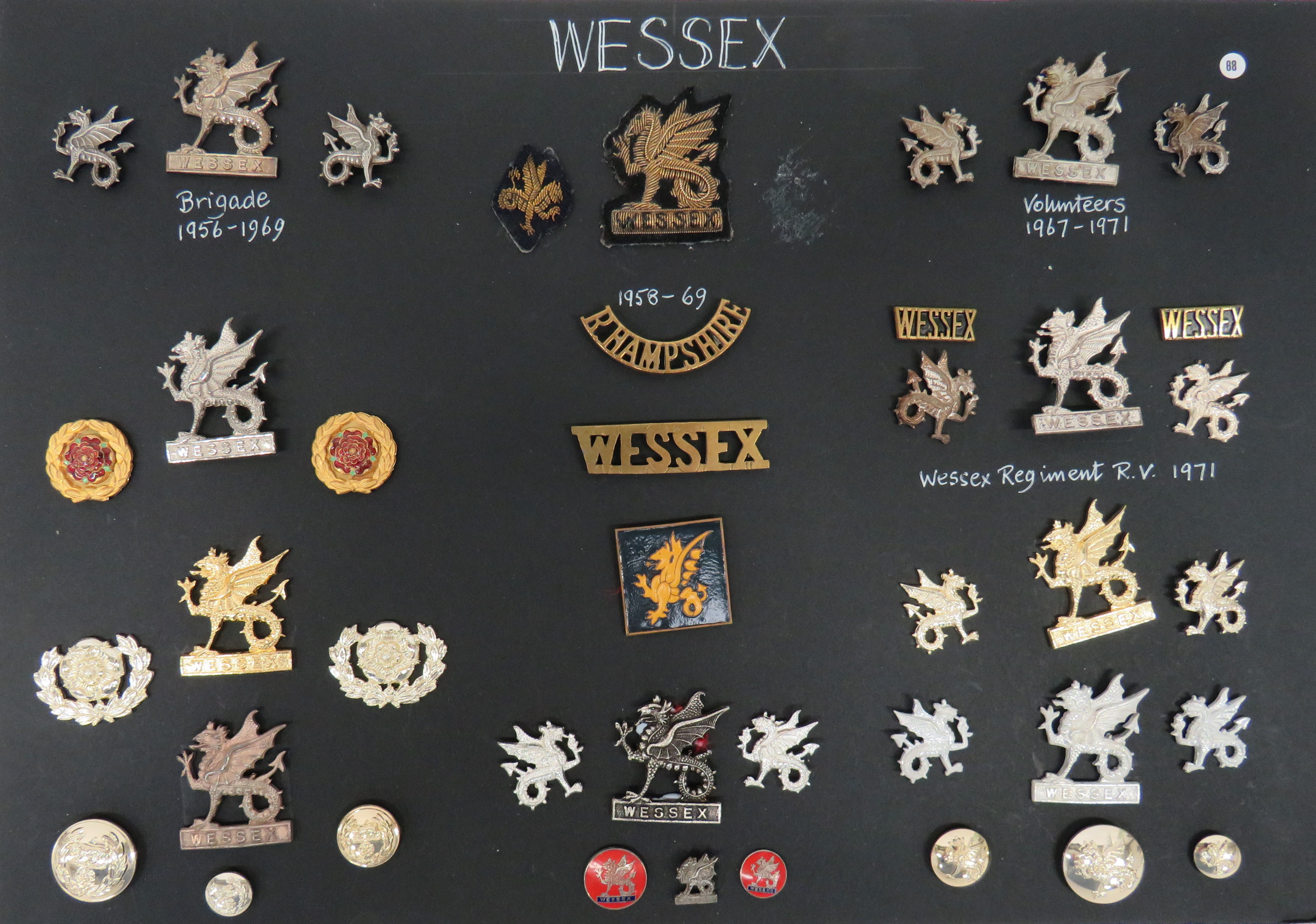 Good Selection of Wessex Cap, Collars and Titles cap include silvered by Gaunt ... Cast white