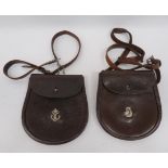 Two Scottish Undress Sporrans consisting brown leather sporran. The top flap secured by a plated