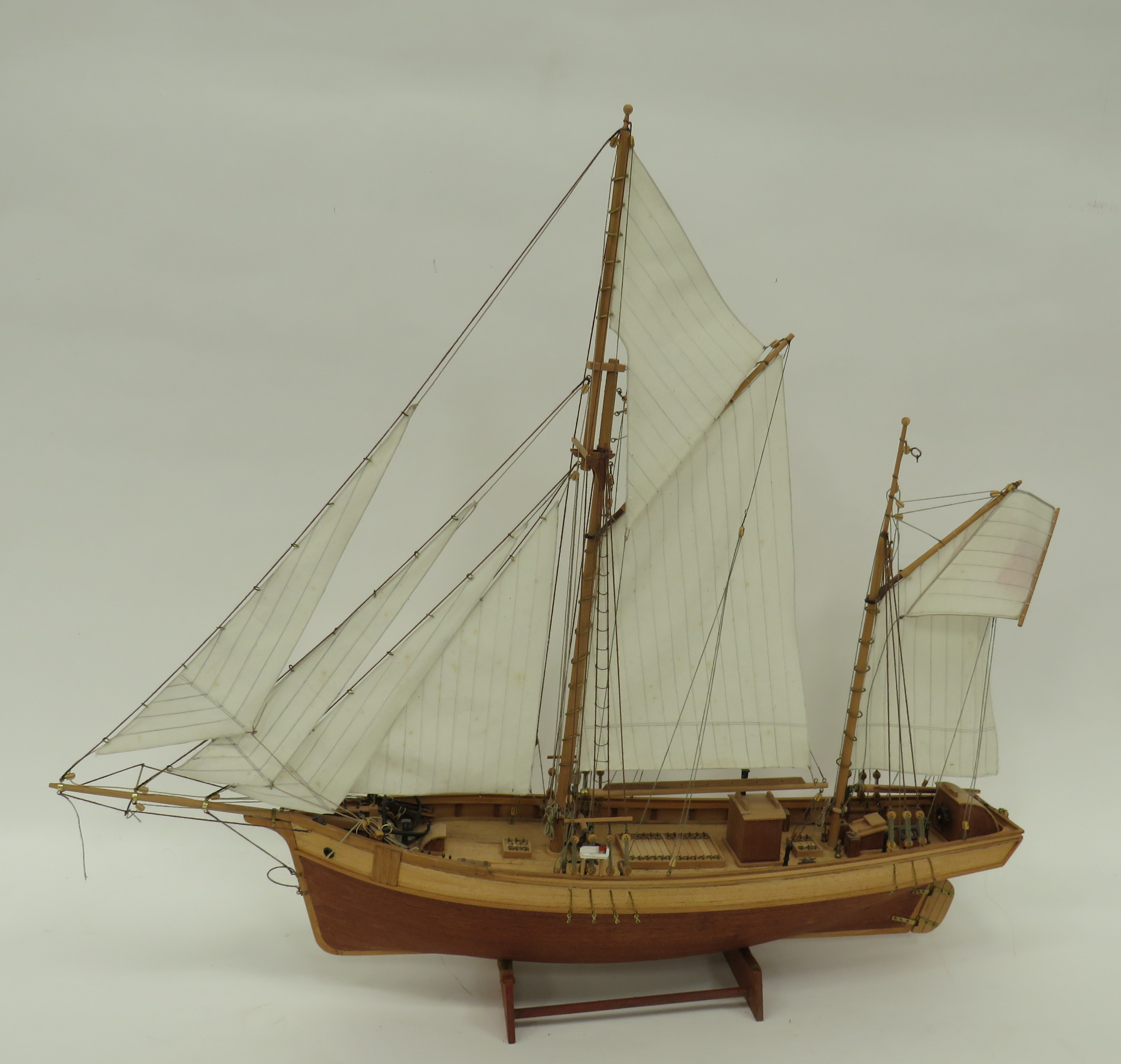 Well Made Wooden Model of a Schooner 24 inches. Wooden planked hull and deck with wooden and metal