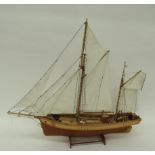 Well Made Wooden Model of a Schooner 24 inches. Wooden planked hull and deck with wooden and metal