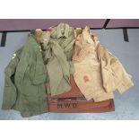 Small Selection of Various Military Uniforms consisting khaki, single breasted, open collar tunic.