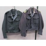 Two British Civil Defence Battle Dress Jackets dark blue/ black, single breasted, closed collar,