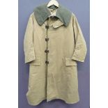 1940 Dated Tropal Coat khaki tan, heavy canvas, single breasted, long jacket. The front secured by