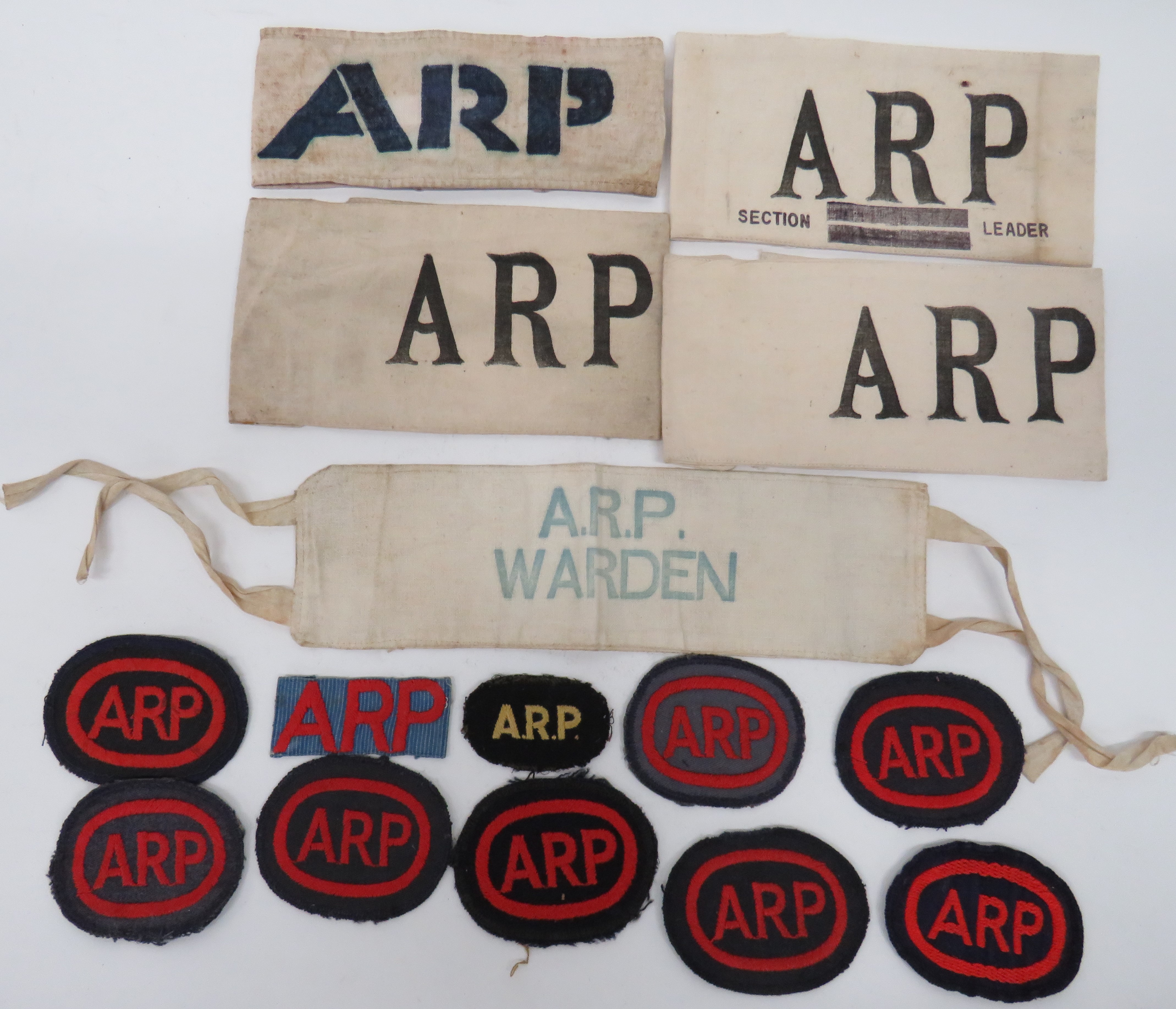 5 ARP (Air Raid Precautions) WW2 period arm bands and 10 breast badges. ARP/WARDEN ... ARP/SECTION