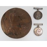 WW1 Memorial Plaque and Two War Medals consisting bronzed Memorial plaque. Naming erased. Together