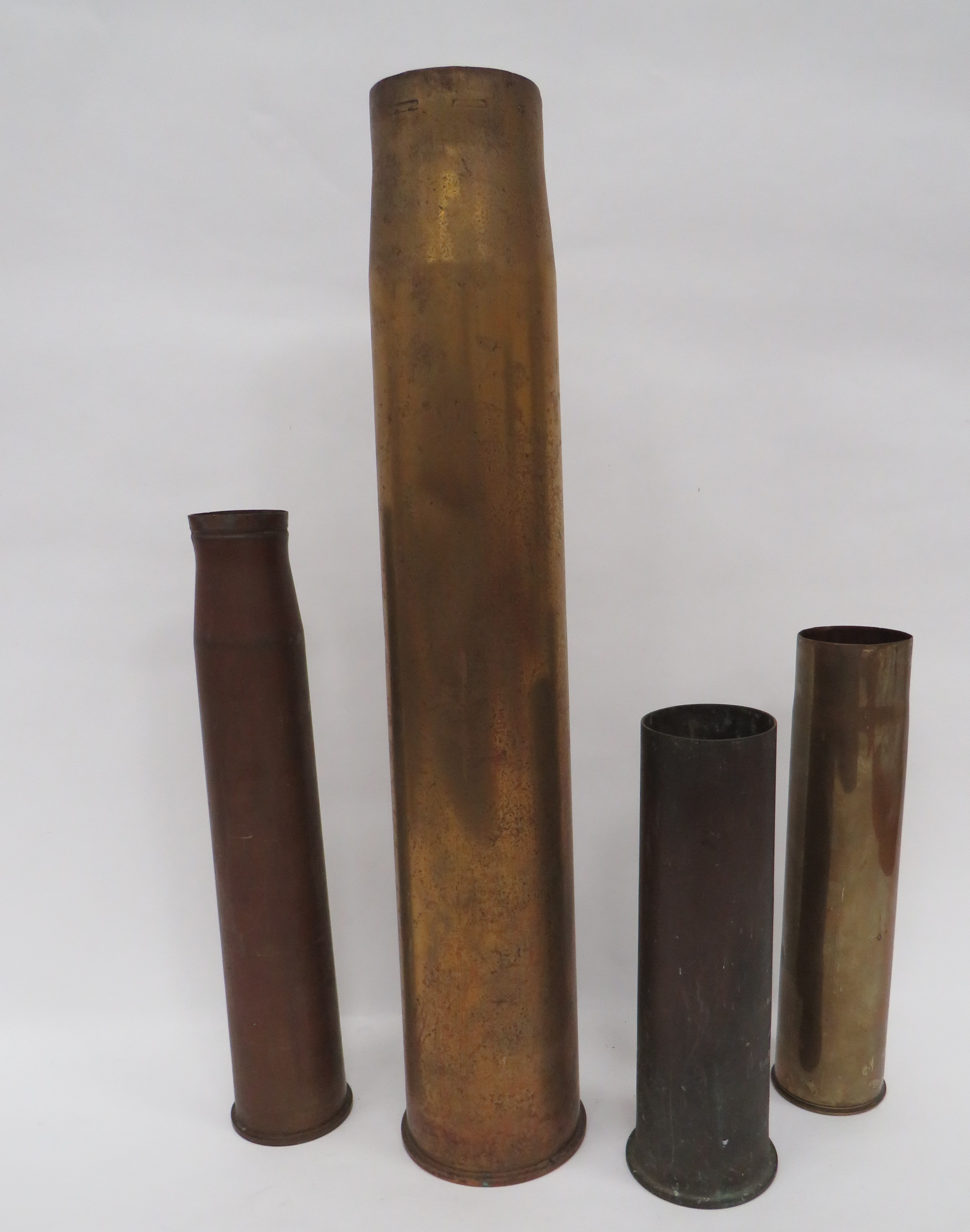 Four Various Brass Shell Cases consisting 1942 dated, 6 pr. 7 cwt ... 1941 dated, 37 gun ... 75