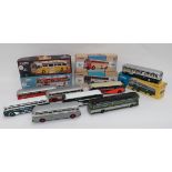 Thirteen Various Corgi Classics USA Coaches five in makers‚Äô boxes. The remainder loose.