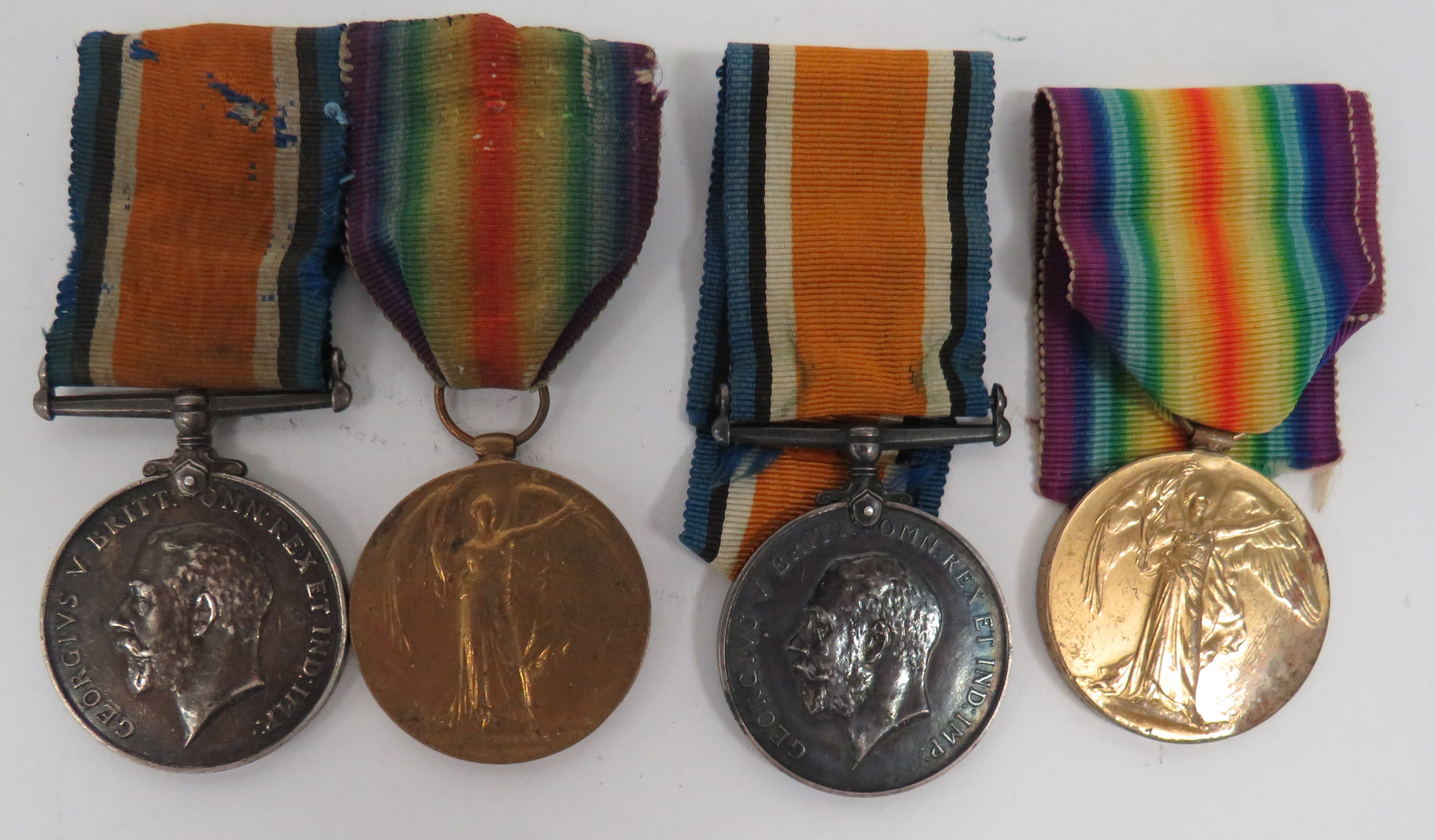 Two WW1 Infantry Medal Pairs consisting silver War medal and Victory named ‚'6242 Pte F. Gidley 6-