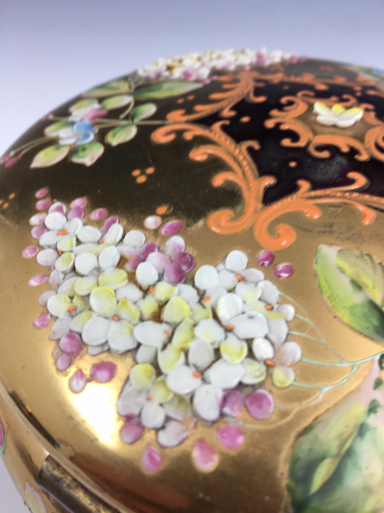 A French porcelain and gilt metal box, 20th century, painted with a floral reserve with gilt - Image 13 of 22