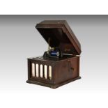 A mahogany cased Edison phonograph, having front shaped grill and built in horn to carcass, 15in. (