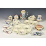 A large collection of traditional Poole Pottery tableware, of varying patterns including an hors d'