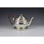 A George III silver teapot and stand, Charles Fox I, London, 1804, of bellied oval form, having