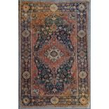 An antique Tabriz part silk rug, the concentric lozenge central pendant medallion and conforming
