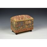 A tapestry covered ottoman style jewellery casket, 20th century, decorated with a young maiden and