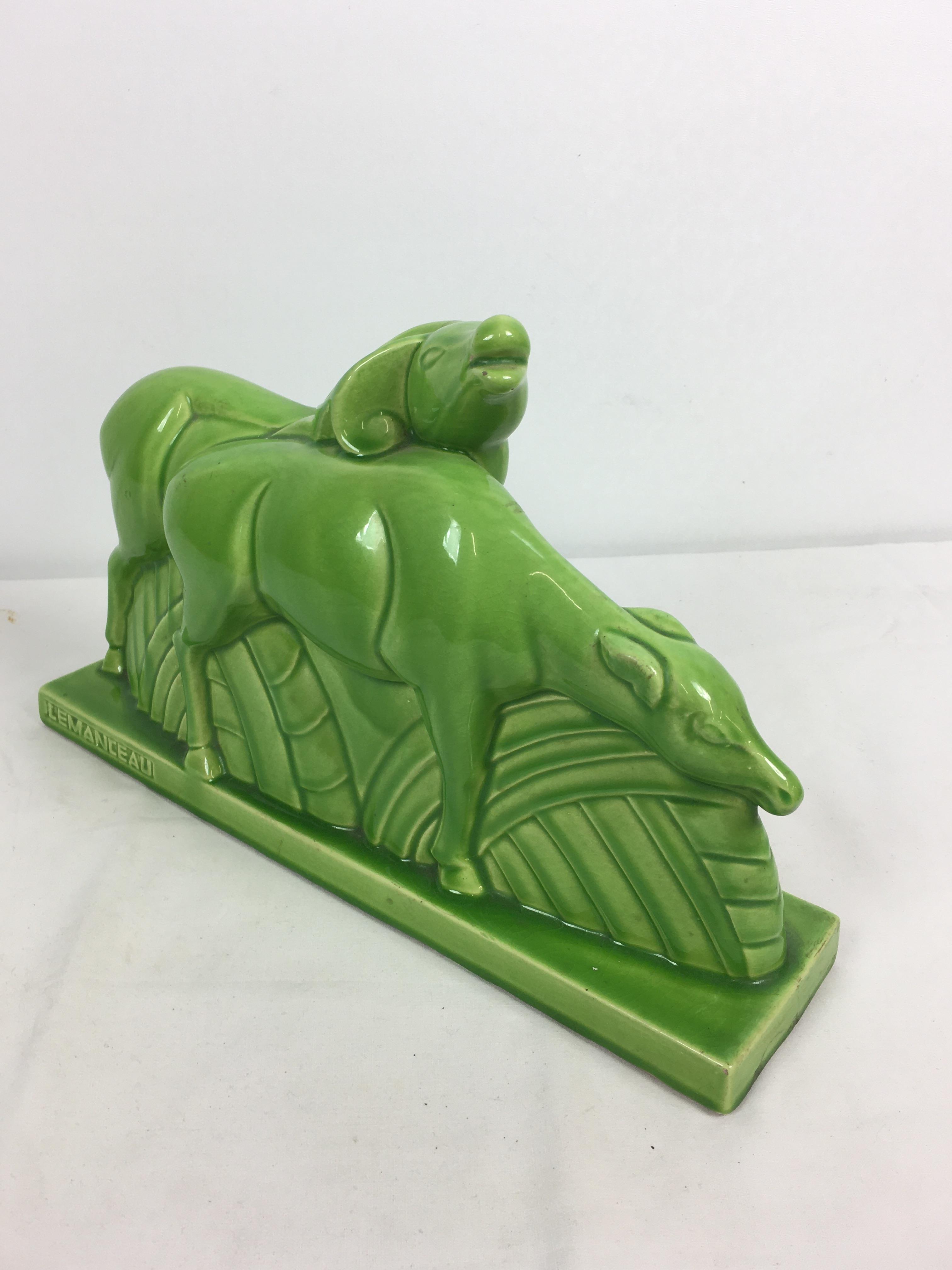 Charles Lemanceau - A French Art Deco green glazed pottery figure group of two stylized buffalo or - Image 11 of 11