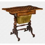 A Victorian burr walnut games and work table, the serpentine fold-over top swivelling to reveal