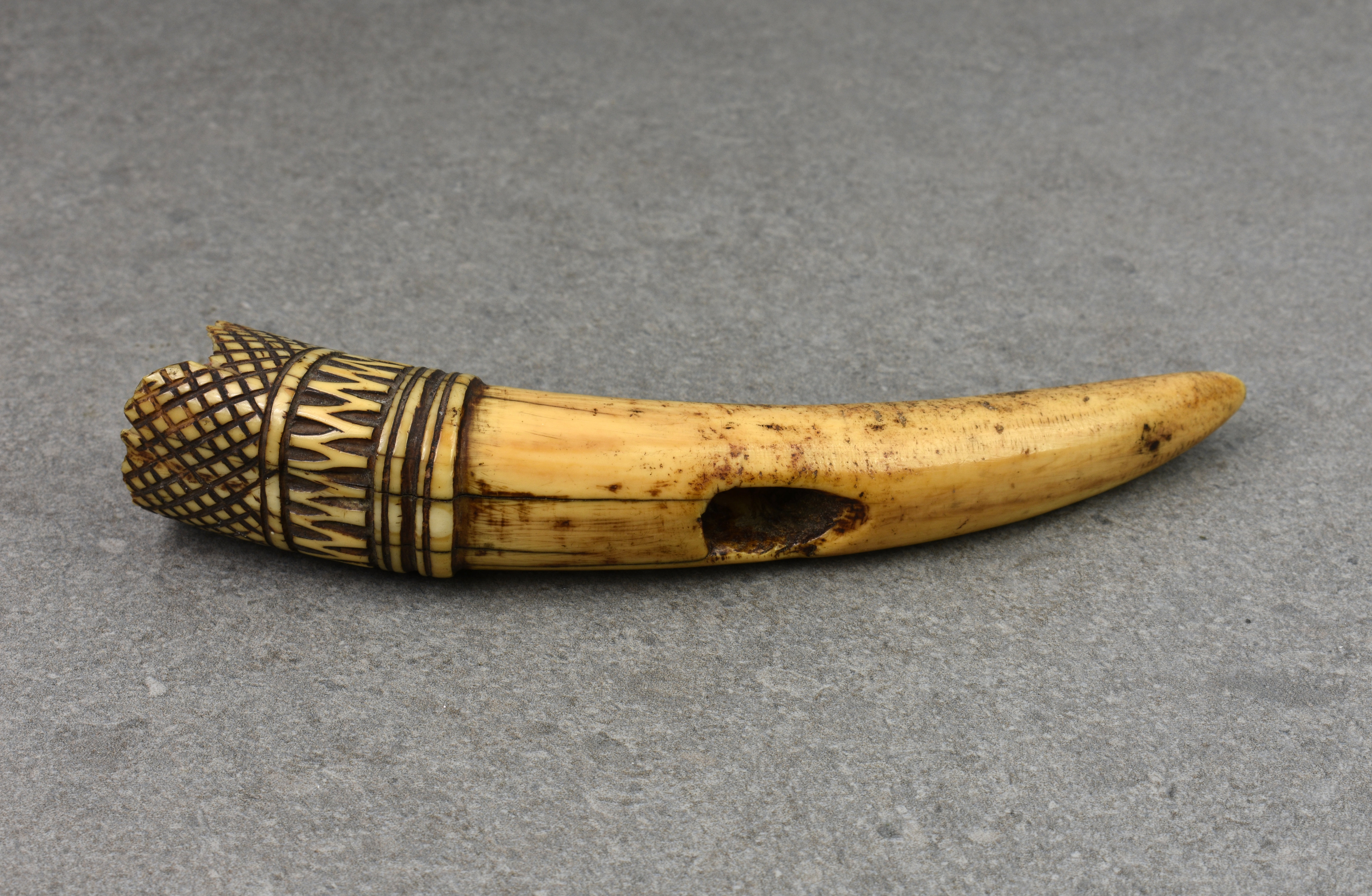 A 19th century or earlier carved African tribal tusk ornament, probably used hanging from a - Image 2 of 3
