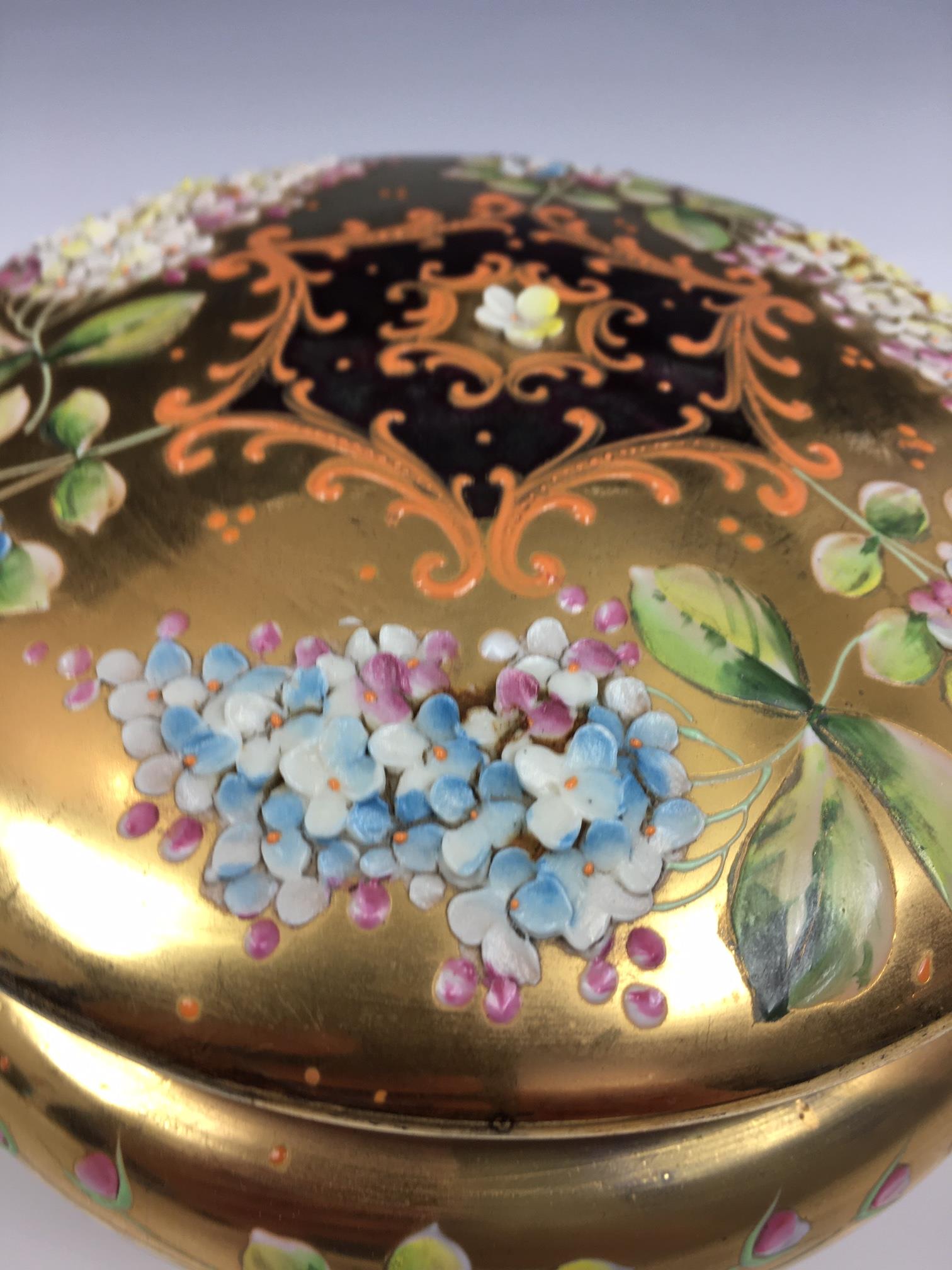 A French porcelain and gilt metal box, 20th century, painted with a floral reserve with gilt - Image 12 of 22