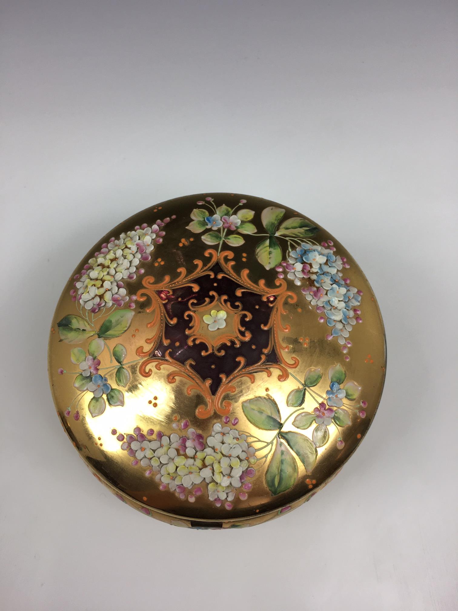 A French porcelain and gilt metal box, 20th century, painted with a floral reserve with gilt - Image 9 of 22