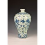 A Chinese Yuan or early Ming style porcelain Meiping vase, painted in blue against a pale celadon