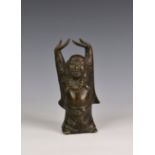 A Chinese bronze buddha figure, late 19th century or earlier, standing with hands above his head,