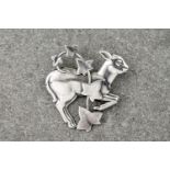 A Georg Jensen silver brooch designed by Arno Malinowski, model No. 311, c.1945, shaped, pierced and