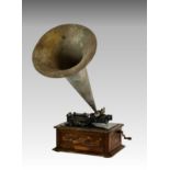 An oak cased Edison Triumph phonograph, having matched aluminium horn, serial number 39729, banner