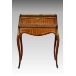 A French Louis XVI style rosewood, kingwood and parquetry bonheur du jour, 19th century, the top