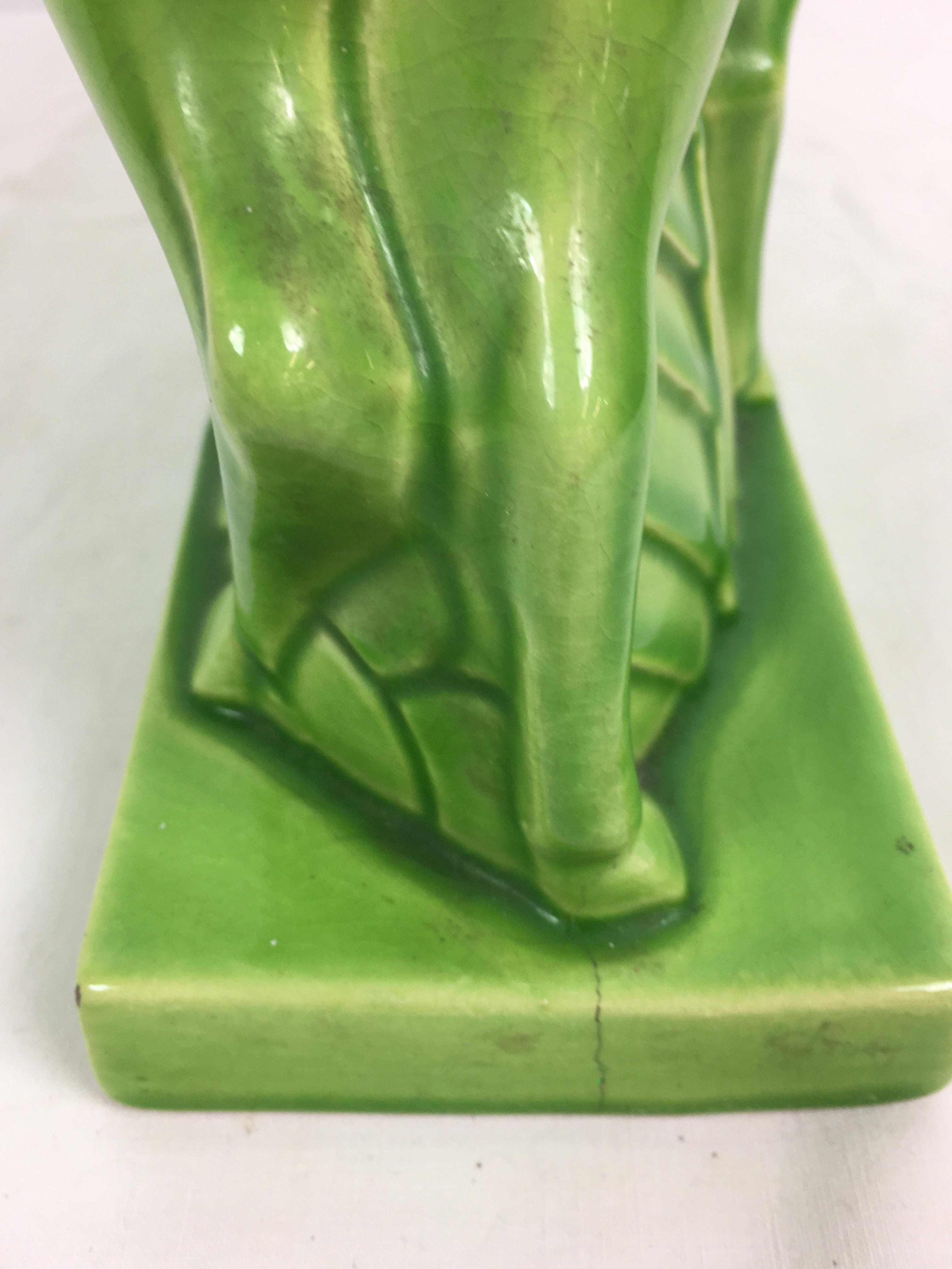 Charles Lemanceau - A French Art Deco green glazed pottery figure group of two stylized buffalo or - Image 9 of 11