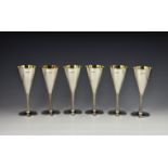 A set of six modernist silver champagne goblets, E H Parkin & Co, Sheffield, 1977, having Jubilee