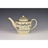 A George III creamware teapot - possibly Channel Islands, with deep cream glaze enamelled in dark