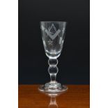 A large Masonic engraved crystal wine goblet, early 20th century, with folded foot and double