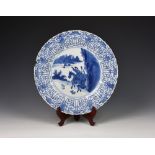 A Chinese kraak porcelain blue and white dish, six character Chenghua mark to base within double