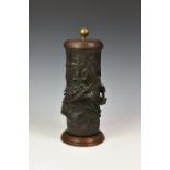 A late 19th century Japanese bronze dragon vase, having cast bronze dragon chasing a flaming pearl