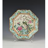 A Chinese Canton export famille rose octagonal plate, 19th century, heavily potted, the central