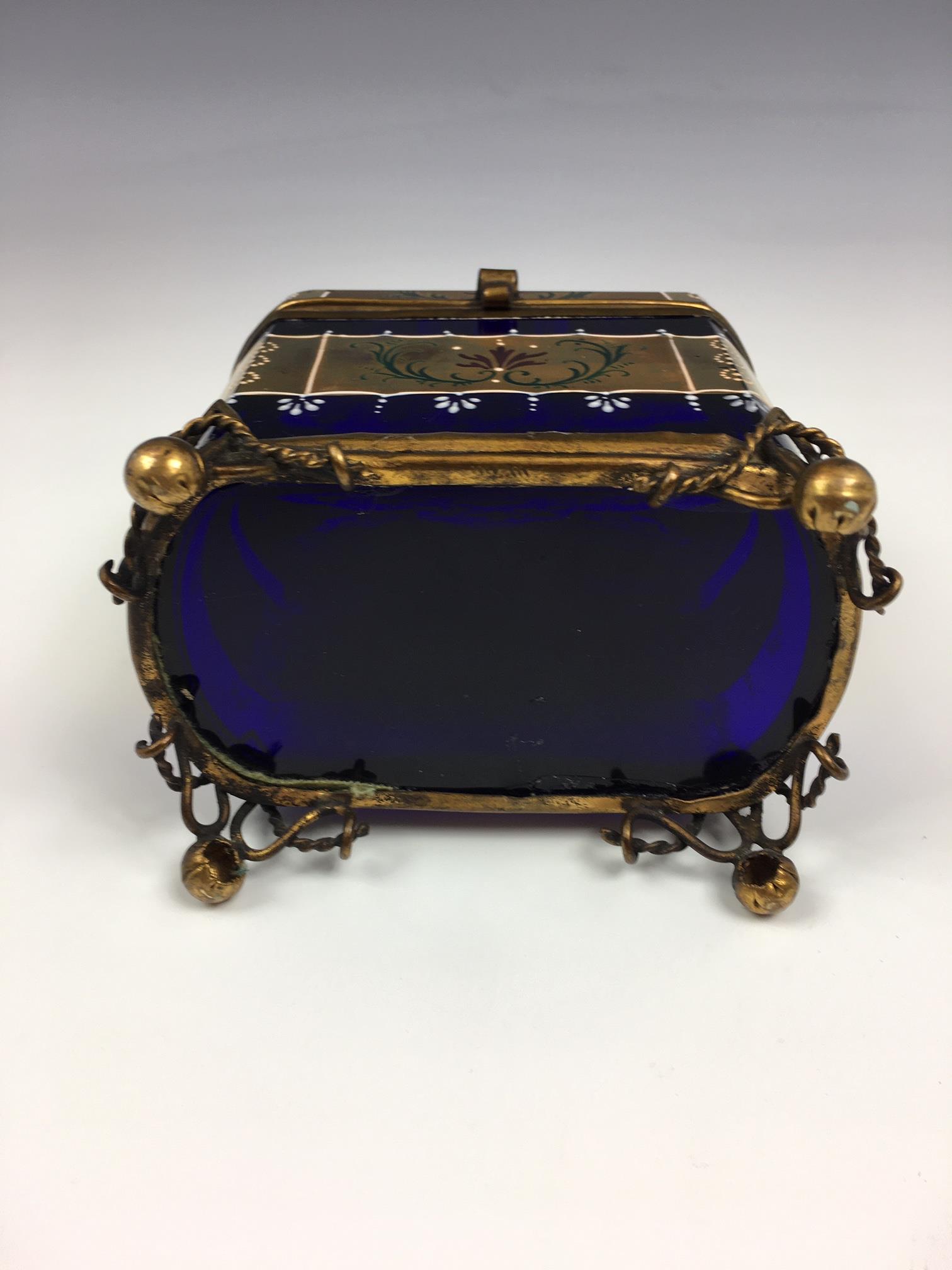 A French porcelain and gilt metal box, 20th century, painted with a floral reserve with gilt - Image 7 of 22