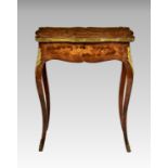 A French Louis XVI style rosewood, kingwood and marquetry table de toilette, 19th century, the