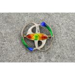 An Archibald Knox for Liberty & Co Arts & Crafts ' CYMRIC ' silver and enamel brooch, stamped