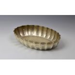 A Victorian silver pie-crust dish, Hukin & Heath, Birmingham, 1897, of ribbed oval form, 8¼in. (
