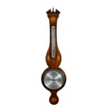 An Edwardian fiddleback mahogany and marquetry Regency style wheel barometer, by Warren of