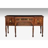 A late Regency mahogany breakfront sideboard, with ebony strung mouldings, the centre with a
