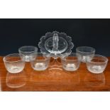A set of six late Georgian cut and engraved glass finger bowls, with comb cut and sprig engraved rim