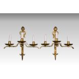 A pair of gilt metal Gothic style wall lights, probably early 20th century, the three scalloped