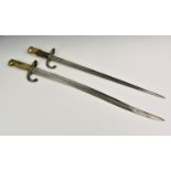 Two French 19th century bayonets, comprising of M1874 Gras Epee bayonet, dated and inscribed " Mre