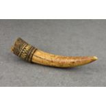 A 19th century or earlier carved African tribal tusk ornament, probably used hanging from a