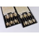 Two cased sets of silver shooting spoons, each cased set of Old English pattern teaspoons made in