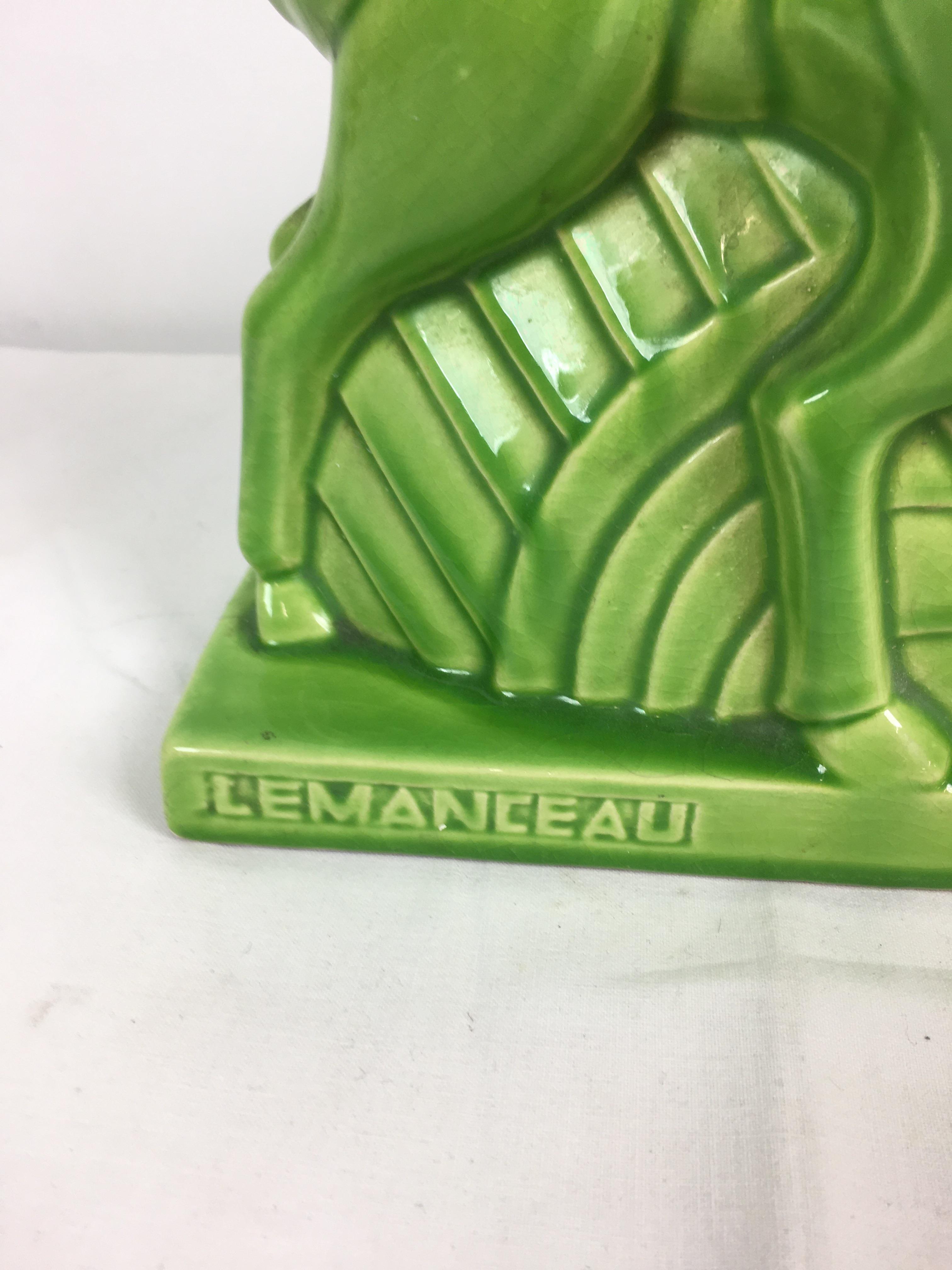 Charles Lemanceau - A French Art Deco green glazed pottery figure group of two stylized buffalo or - Image 3 of 11