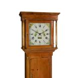 An early 19th century waxed pine 30 hour longcase clock by T. Watson, the square painted Roman