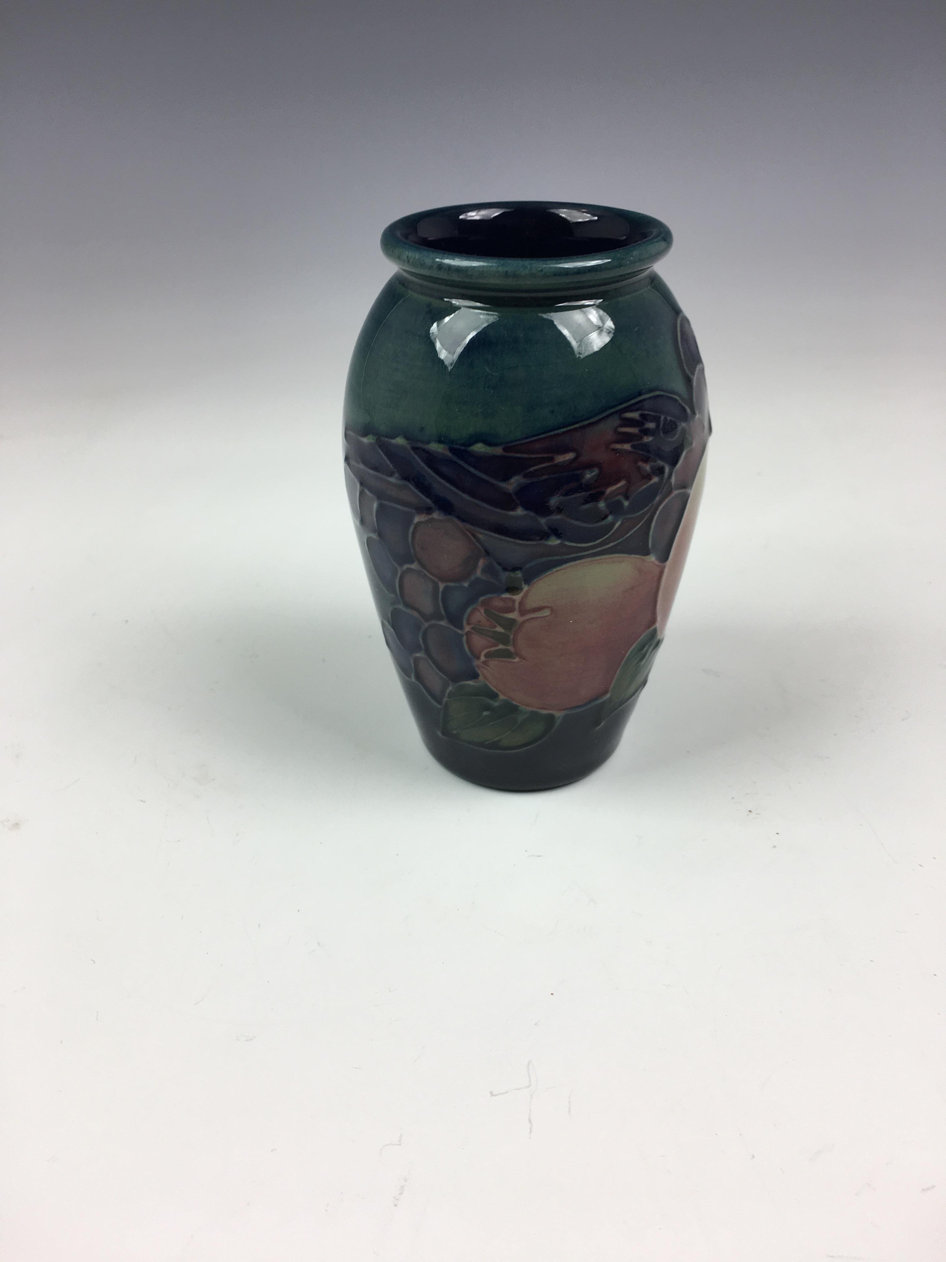 A modern Moorcroft 'Birds and Fruit' vase, the small ovoid vase decorated with birds and fruit on - Image 4 of 7